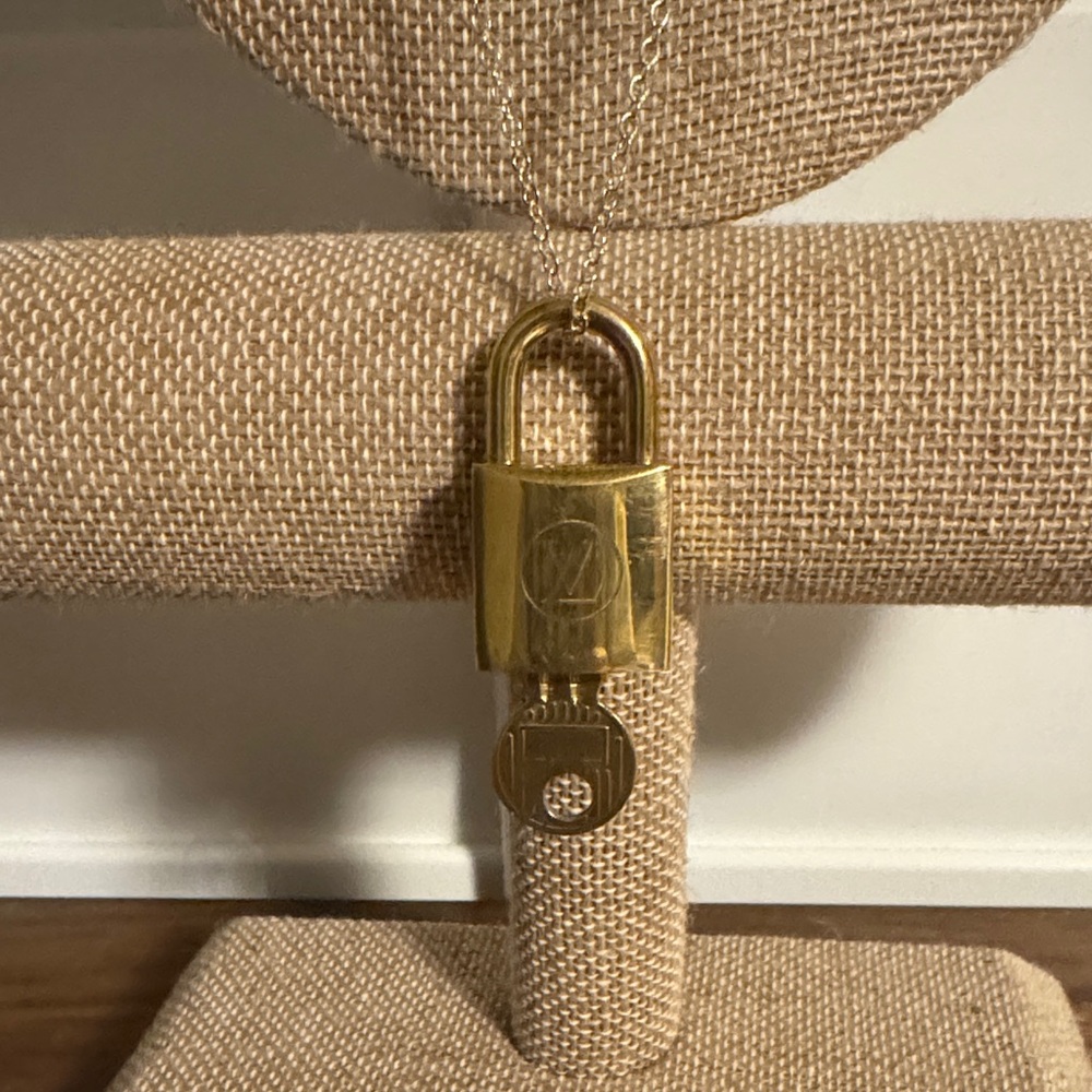 Louis Vuitton Gold Padlock 208